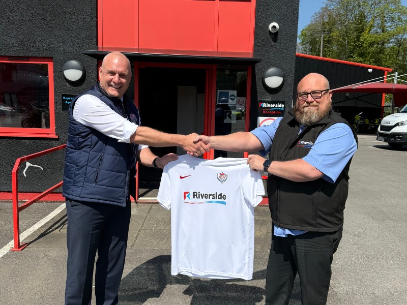 Riverside and SWPFC shake hands as they sponsor them at the World Police & Fire Games 2025
